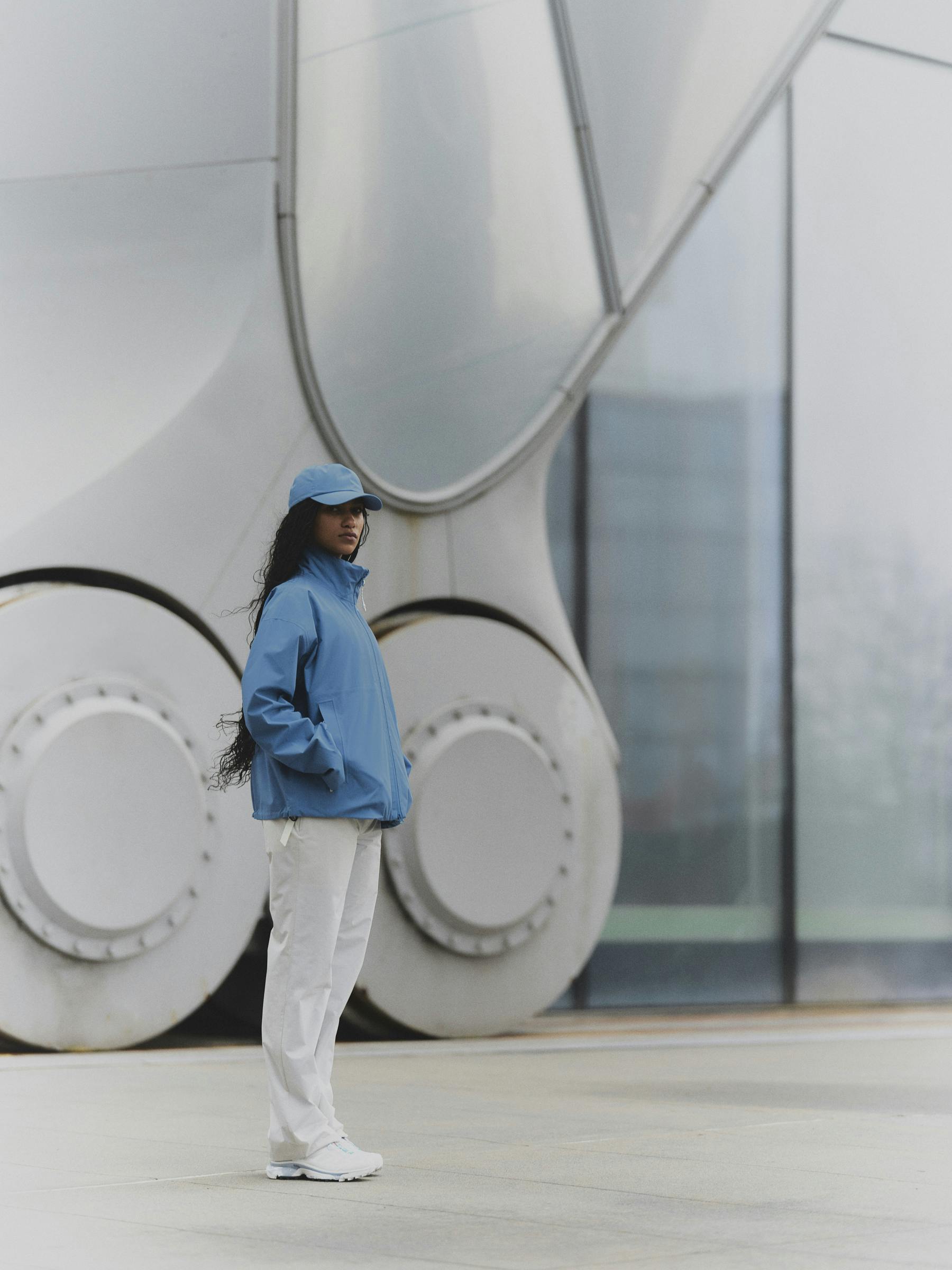 Woman wearing the Hatlane caps and Synes jacket from BLÆST