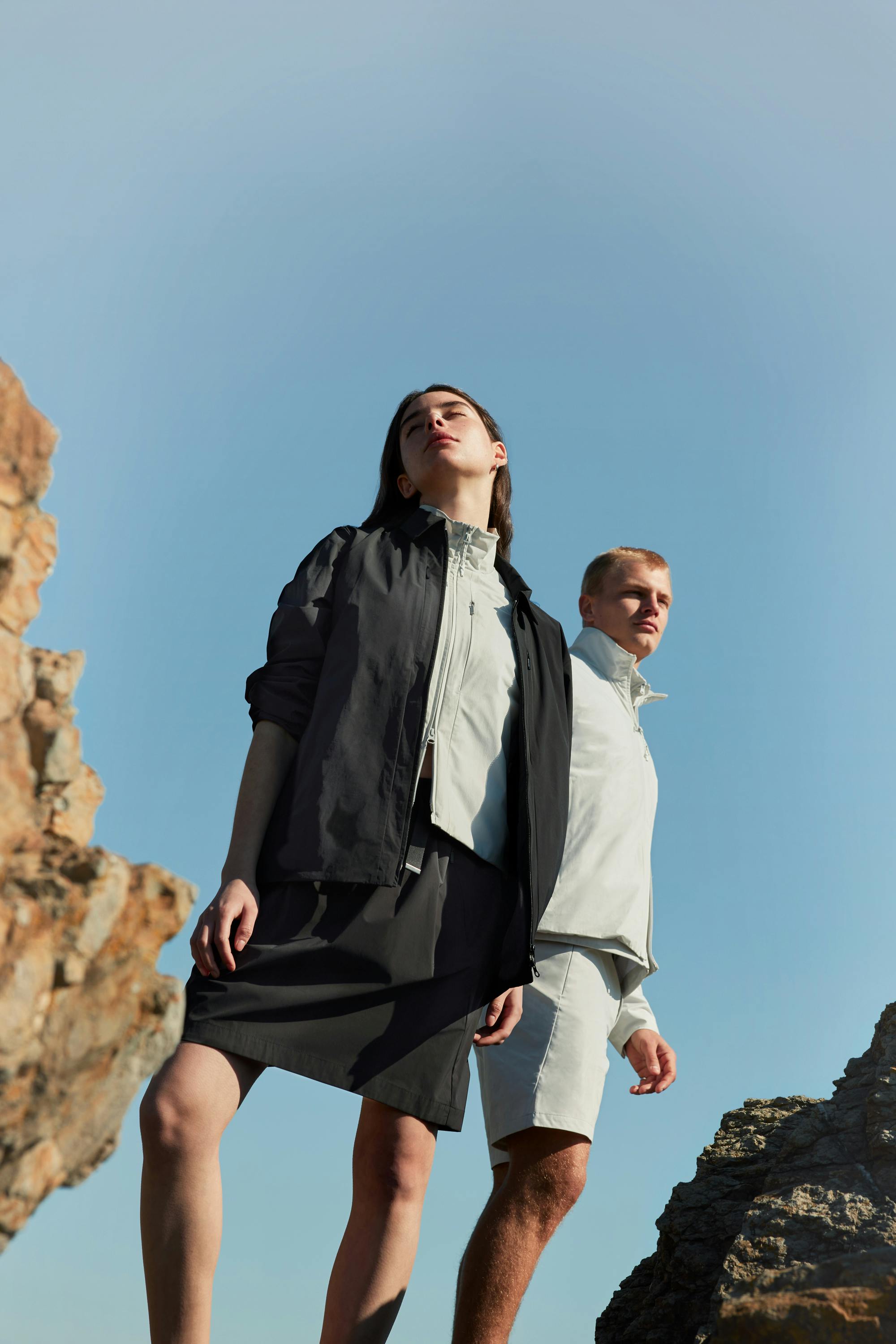 Woman wearing the Hjelle lightweight jacket and skirt from BLÆST